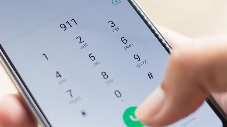 Person dialing 911